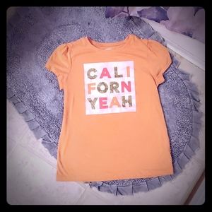 A t-shirt size XL(14)